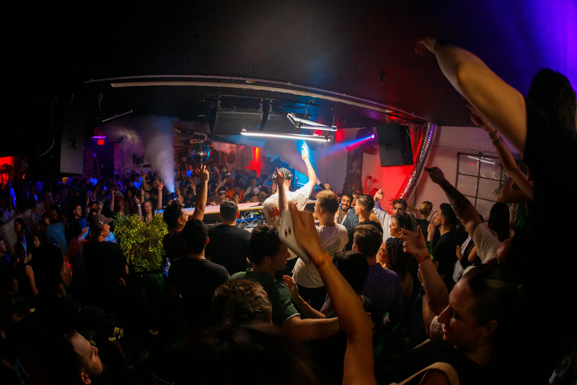 vibrant nightclub scene with people dancing